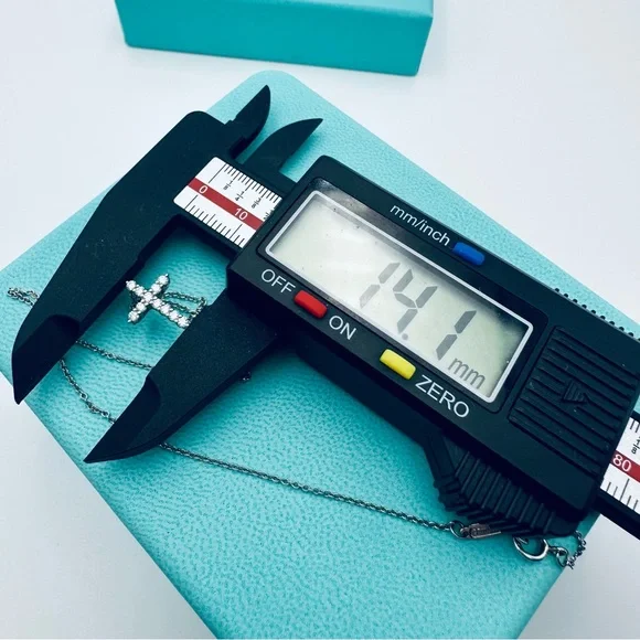 Tiffany & Co. .21 TCW Diamond Cross Necklace in Platinum with Packaging - Picture 10 of 13